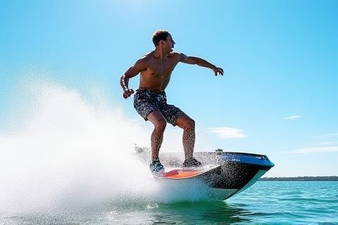 Card image for wakeboarding sessions showing a person jumping behind a boat